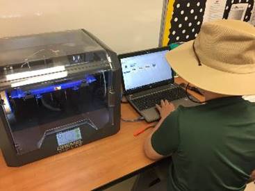 An elementary school student uploads a 3d-printing design