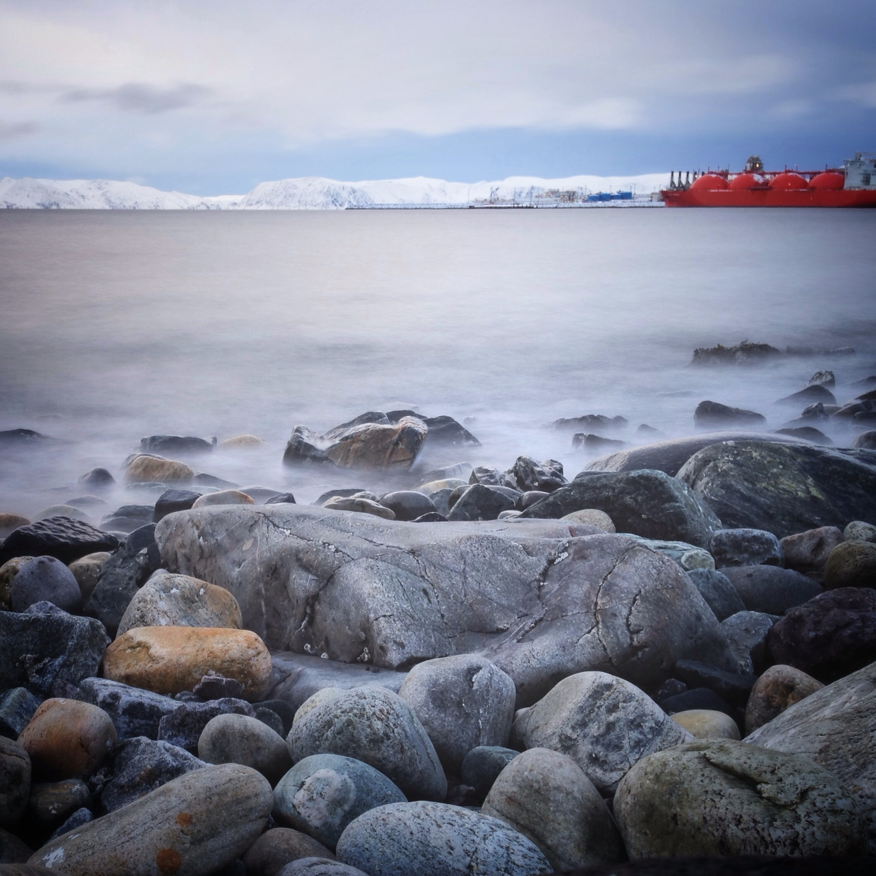 This week, we’re visiting the Statoil Melkøya facility in Hammerfest, Norway, one of the northernmost towns in the world. This liquid natural gas facility is partially powered by five GE LM6000 gas turbines, each generating over 40,000 kW of power.  We’re excited to have Reuben Wu and Finn Beale with us to capture some stunning behind-the-scenes photographs. Pictured above, a vessel off the island of Melkøya in the Barents Sea prepares to ship natural gas across 15,000 nautical miles to partners globally. Photo by Reuben Wu.