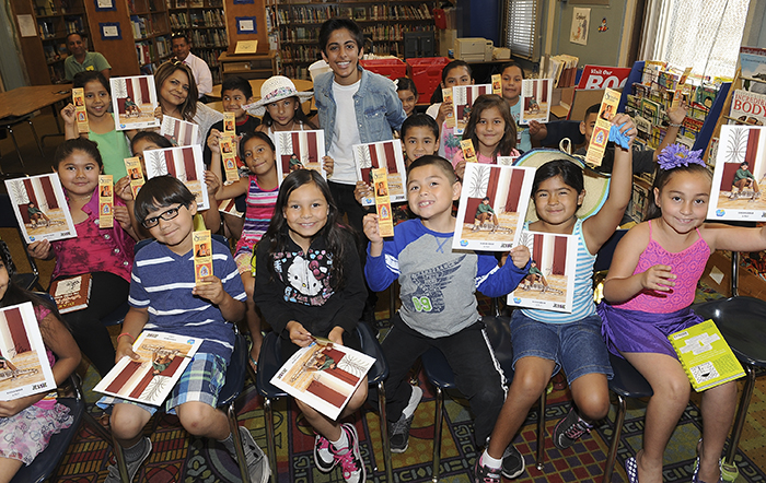 Actor Karan Brar reads to second graders for the SAG Foundation's Children's Literacy Programs at San Fernando Elementary School in San Fernando, California.  Photo: Angela Weiss/Getty Images for SAG Foundation