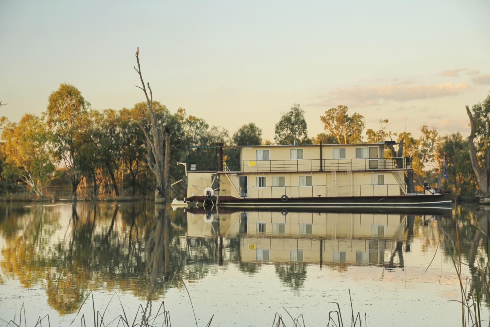  /><br />
<br />
<em>The picturesque Murray River&nbsp;is the main source of water for South Australians. Water is pumped from here to users throughout the state. Source: Getty Images</em><br />
<br />
“I don’t know what SA Water’s total power bill is,” says McMichael, but he estimates that, “the power bill for discretionary pumping is probably about $15 million dollars [a year], and it varies depending on how much rain we get. So if it rains a lot we don’t have to pump as much, and the bill can be dramatically less.”<br />
<br />
Discretionary became the operative word to achieving more savings on electricity. That is, there’s some leeway as to when water is pumped to users. Pumping doesn’t have to be continuous to maintain supply. And the price of electricity is extremely variable depending on demand at different times of day and year, and how much electricity is being generated by, say, renewable sources such as wind. “The price can be -$1,000 a megawatt—that’s negative $1,000—or $13,000 a megawatt, or anything in between,” says McMichael, “but typically it’s between $20 and $60 a megawatt.” If SA Water could accurately forecast when the energy spot price was lower, it could orient its pumping schedule towards those times, and avoid paying premium prices.<br />
<br />
Of course, that meant tearing up the contracts with electricity providers who typically absorb the risk of fluctuations by charging a fairly steady and usually inflated price for electricity. It also meant that forecasting the price of electricity became crucial, and that this information would have to be supplied to pumping-station operators in time for them to take advantage of changes—to turn the pumps on or off, accordingly.<br />
<br />
At GE, Nevena Andric, an electronics engineer working in presales for GE’s Intelligent Platforms recalls, “My manager at the time, Ian Larsen, was having a conversation with SA Water about energy costs, and what they were doing at the control layer to help people manage them. They said they needed to bridge the gap between the energy price information they were getting from the distribution companies with what was actually showing to the operator. And Ian said, ‘Well, I think we can do that.’”<br />
<br />
Larsen handed over to Andric who began configuring a GE software package called&nbsp;<a href=