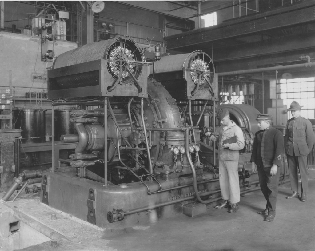 Alexanderson High Frequency Alternator, New Brunswick, New Jersey Wireless Station, being inspected by military. The alernators developed by General Electric engineer Ernst Alexanderson were valuable communication tools during WOrld War I.