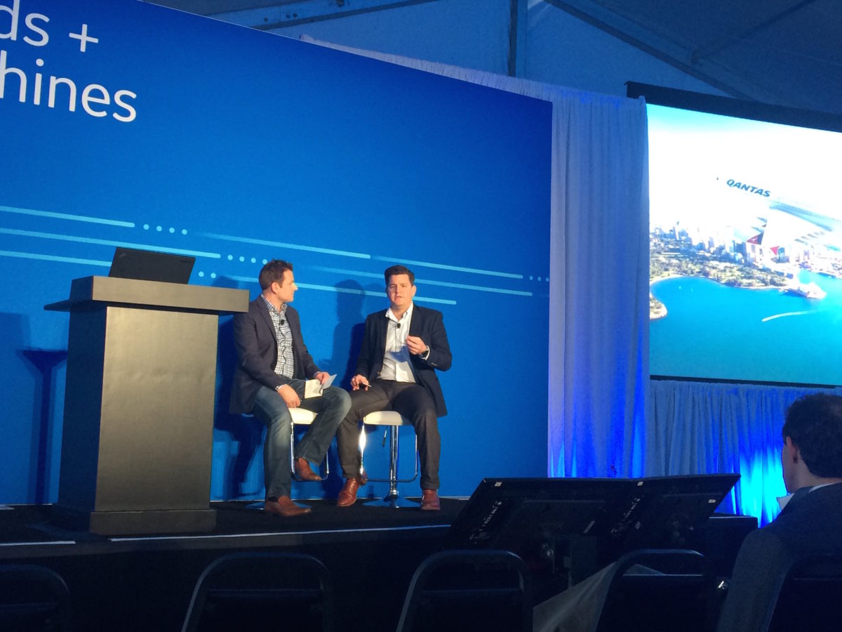 Murray Adams, manager of Operations Analytics and Reporting at Qantas, onstage with GE's Joel Klooster at Minds + Machines 2016, discussing the fuel efficiencies and operational benefits that have resulted from the airline's long partnership with GE.