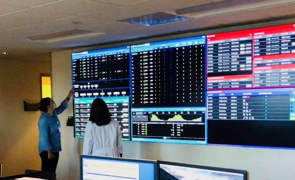 Top: Nathalie Deney, an engineer in GE’s Operations Management Leadership Program, helped GE Gas Power roll out lean management at its plant in Greenville, South Carolina. Above: GE Healthcare designed AI apps to help 64 Oregon hospitals manage critical resources during the peak of the COVID-19 pandemic. Image credit: OSHU.