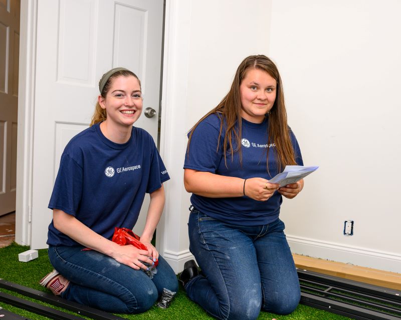 Grace Hamel and Madeline Stanton building a bed