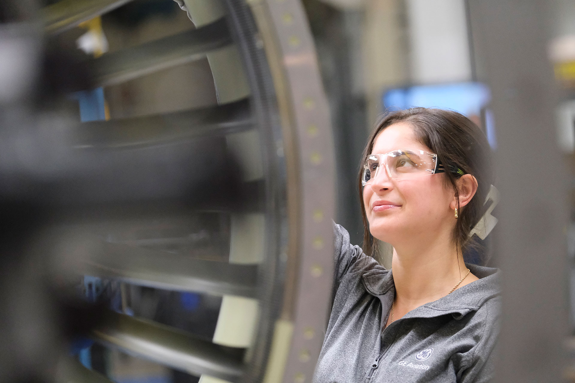 GE Aerospace’s Tatum Ross is a Lead Manufacturing Engineer in Evendale, Ohio, seen here with a Passport engine.