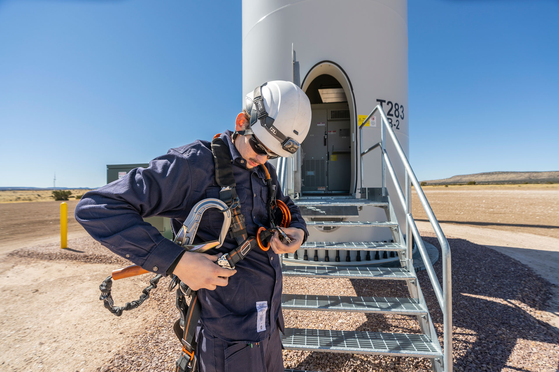 GE Vernova Wind Technician Sage Thill performs a safety check