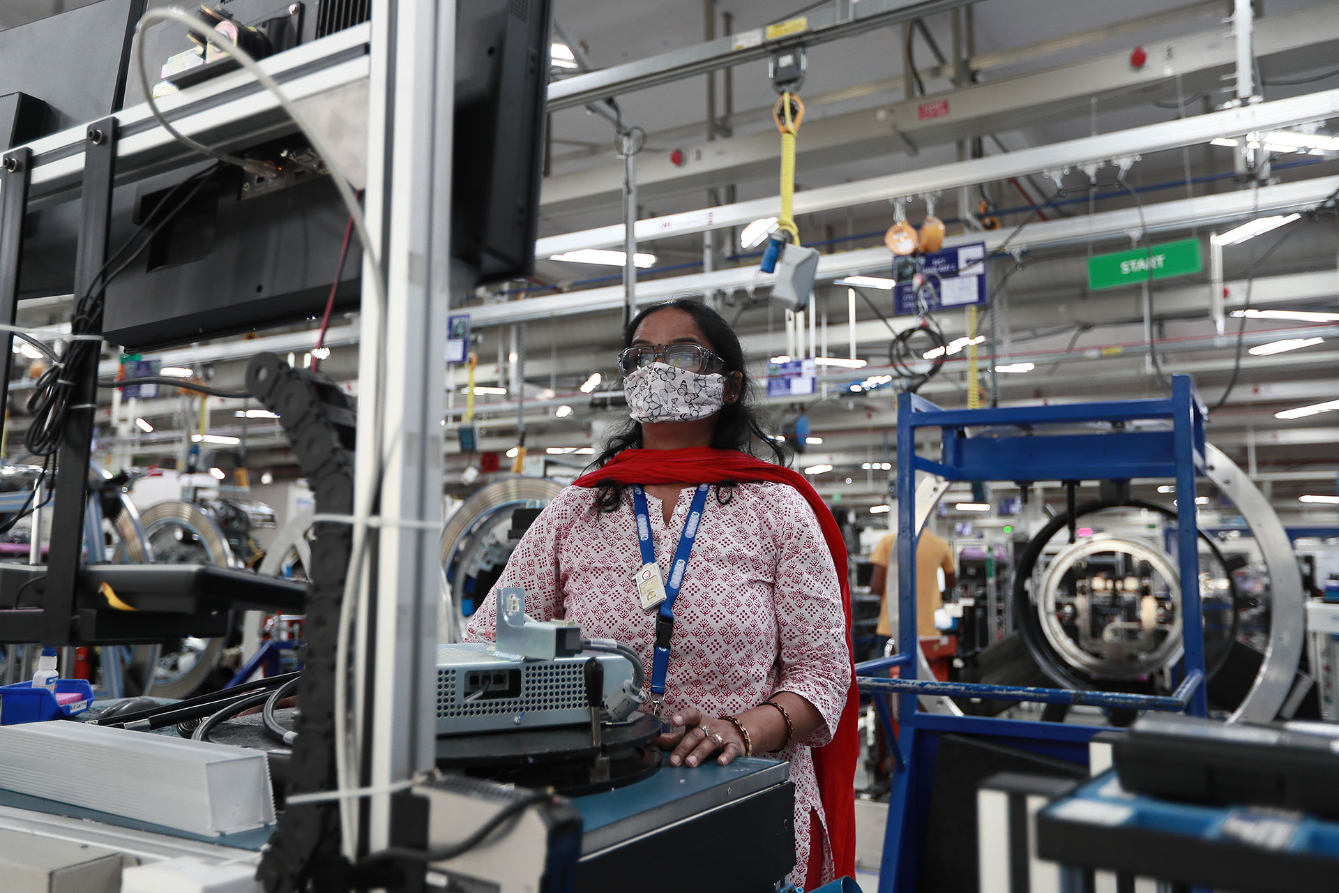 Geetha B.P. in the GE HealthCare plant in Bangalore, India, where high voltage amplifiers for MR subsystems, tubes and generators are made